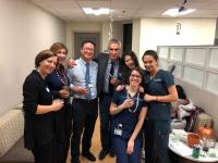 Bana Al Haydar with faculty and fellow residents at the College of Dental Medicine